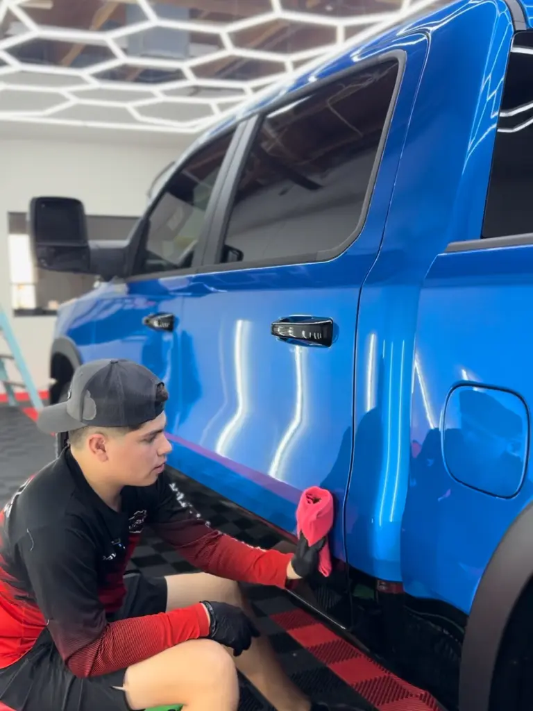 ICON Auto Lab — exterior paint refinement on a blue truck